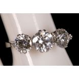 An 18ct white gold and diamond three stone ring, 2.25ct total.