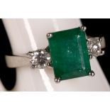 An 18ct white gold emerald and diamond ring, 2.40ct emerald and 0.4ct diamond.