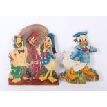 Two hand-painted Donald Duck and friends cut out wooden plaques.