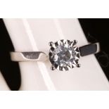 An 18ct white gold and diamond solitaire ring, dia 0.34ct.