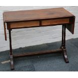 A mahogany and crossbanded sofa table with two frieze drawers, raised on turned supports on four