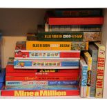 Fourteen boxes of games and jigsaws, with two empty Projector boxes and lots of slides, three