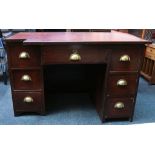 A custom made mahogany twin pedestal leather topped desk, the left hand pedestal being set back,