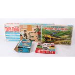Four vintage games, including Penguin Trik-Trak Rally, HO gauge Continental Express Train, Morse
