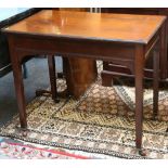 A Victorian mahogany side table with a plain apron, supported on square tapered legs on castors,