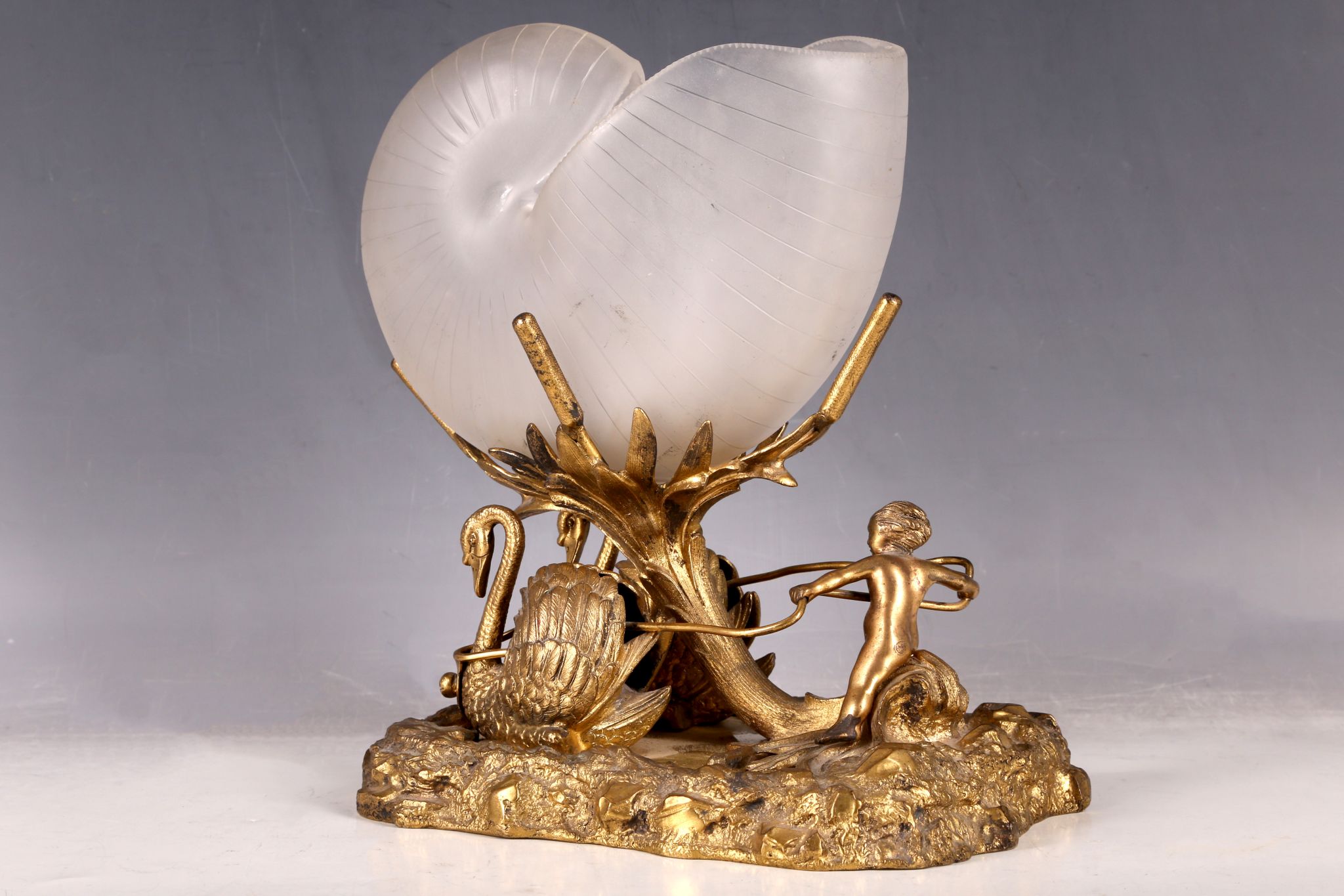 A decorative 19th Century gilt metal table ornament in Palais Royale style, modelled as a cherub and - Bild 2 aus 3