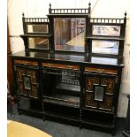 A Victorian Aesthetic Movement ebonised, mirror backed chiffonier, stamped Edwards & Roberts, with