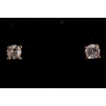A pair of 18ct yellow gold and diamond studs (dia. 0.29ct total).