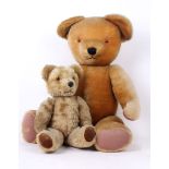 A Merrythought and Pedigree golden mohair teddy bears, English, circa 1960 and circa 1950. The