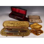 An early 19th Century leather gilt metal glove box, with glove stretchers, a leather jewellery box