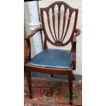 A set of eight (six and two carvers), Hepplewhite style shield-back dining chairs, with drop-in