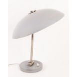 A 1940's grey metal table lamp, grey shade and base, joined by chrome adjustable tilting stem, Louis