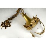 A late 19th Century Continental heavy gilded brass hanging single ceiling light, having original