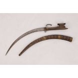 A Persian dagger / short sword, inlaid silver decoration to hilt and scabbard, iron quillon,