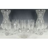 A miscellaneous selection of glass ware, to include a pair of vases, water jugs, glasses, bowls, and
