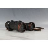 A pair of WW2 era binoculars, Leitz 457512, 7 x 50 ben, rubber to thumb grip area, desiccant