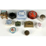 An interesting selection that includes a miniature vitrine, a brass stamp box, and old bottle,