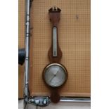 A Victorian mahogany and boxwood strung banjo barometer thermometer with silvered dial, C. Trumlette