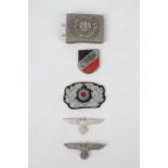 Three WW2 Third Reich badges; two eagles, shield, an infantry cockade and Gott Mit Uns belt