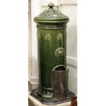A Victorian / Edwardian green glazed Majolica stove, complete with internal metal liner, 90cm.