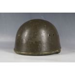 An East German post war Parachute helmet with leather liner and ear protectors.