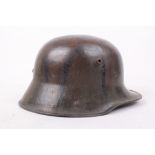 M18 German military helmet, transitional, stamp TJ66? unclear, camouflage decoration, no decals or