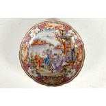 An 18th Century Chinese famille rose tea bowl, decorated with a domestic scene and painted