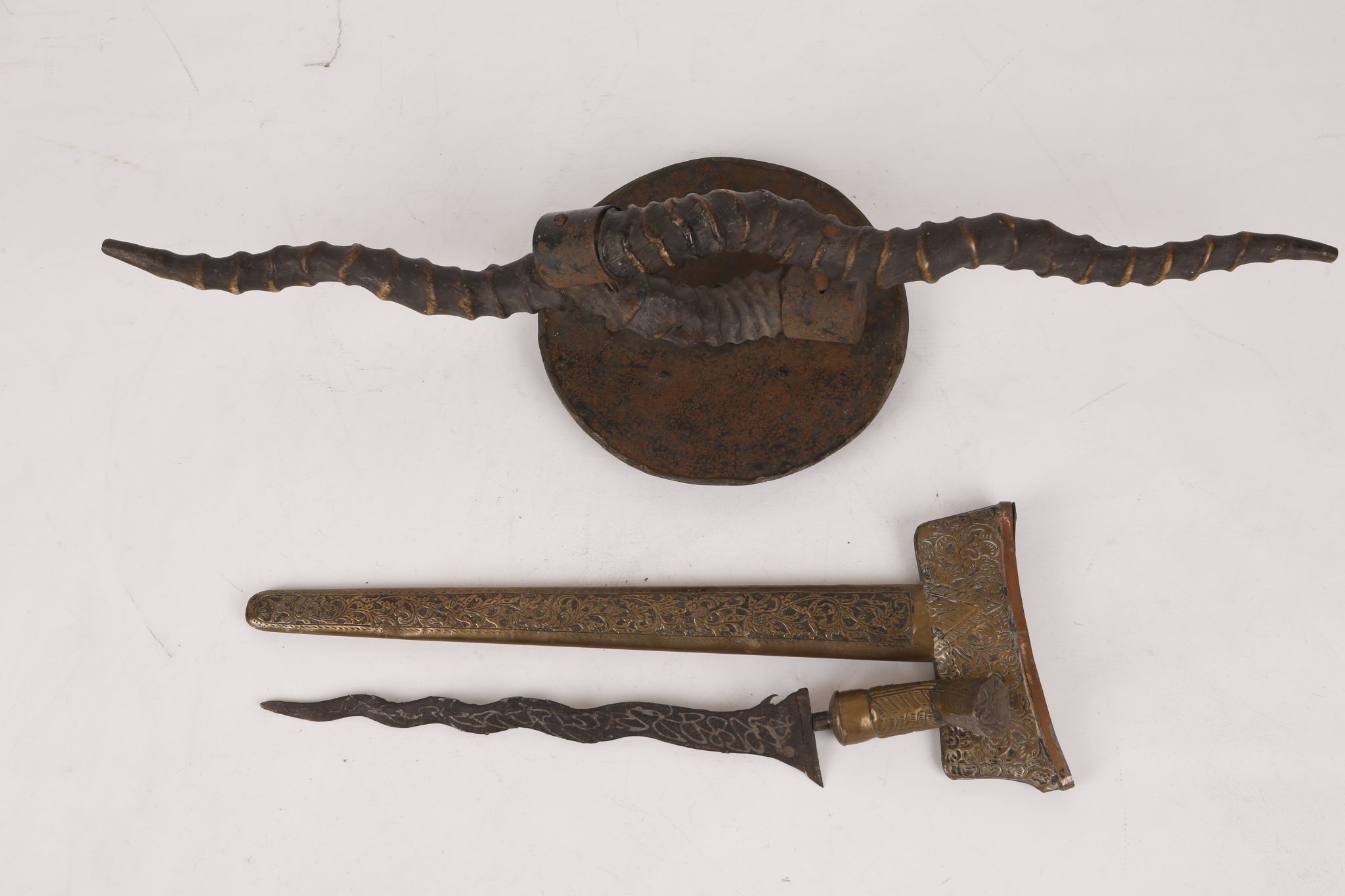 Malayan Kris, brass 'hoof' handle with leaf decoration, trailing branch decoration to 28.5cm