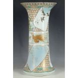 An early 20th Century Japanese porcelain cylindrical shaped vase, decorated with flora and fauna (