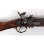 A Victorian percussion musket, Tower 1857 stamp, VR crown mark, walnut stock and body, brass buff