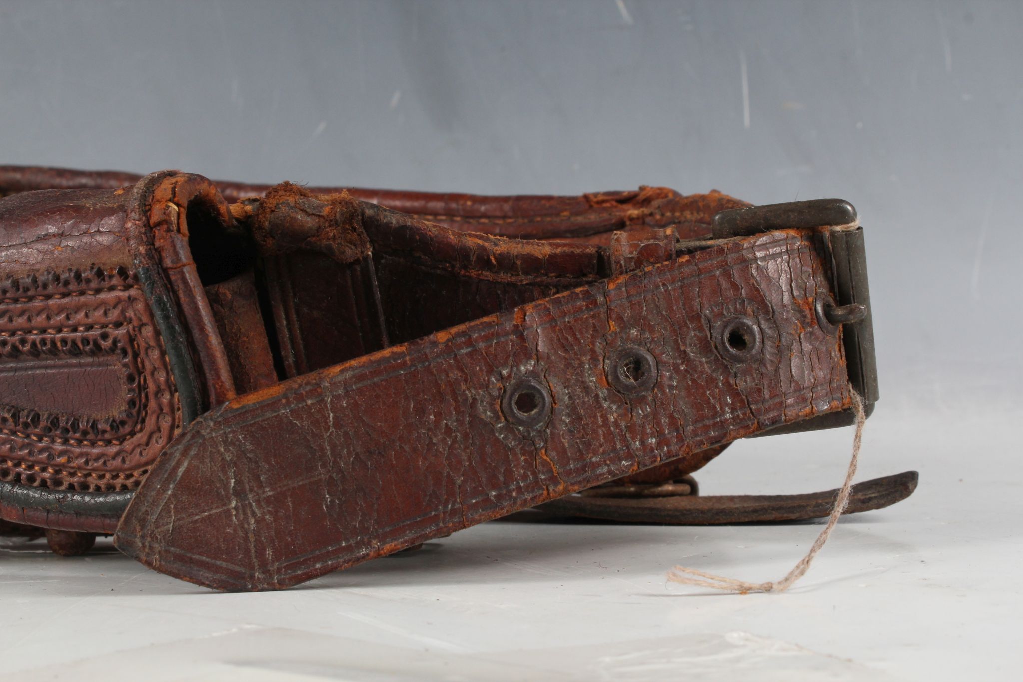 A Mexican hand stitched shot gun cartridge belt, 26 shots with leather weather flap and central - Image 2 of 3