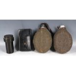 A German Army WW2 equipment; two water bottles, leather pouch and bakelite fuse case.