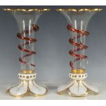 A pair of 19th Century Bohemian glass trumpet form table lustre bases, with white over clear