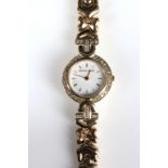 A ladies' 9ct gold and diamond set Bueche Girod dress watch, boxed with papers.