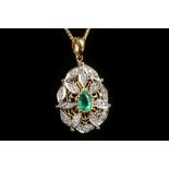 An 18ct yellow gold, emerald and diamond cluster pendant on chain.