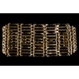 A 9ct gold 12-bar gate link bracelet.