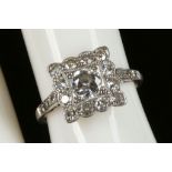 An Art Deco fine platinum and diamond set panel ring.