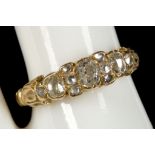 A Victorian 18ct yellow gold and diamond set cluster band ring.