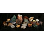 A small collection of mineral crystals and rocks, samples comprising Tigers eye, calcite,