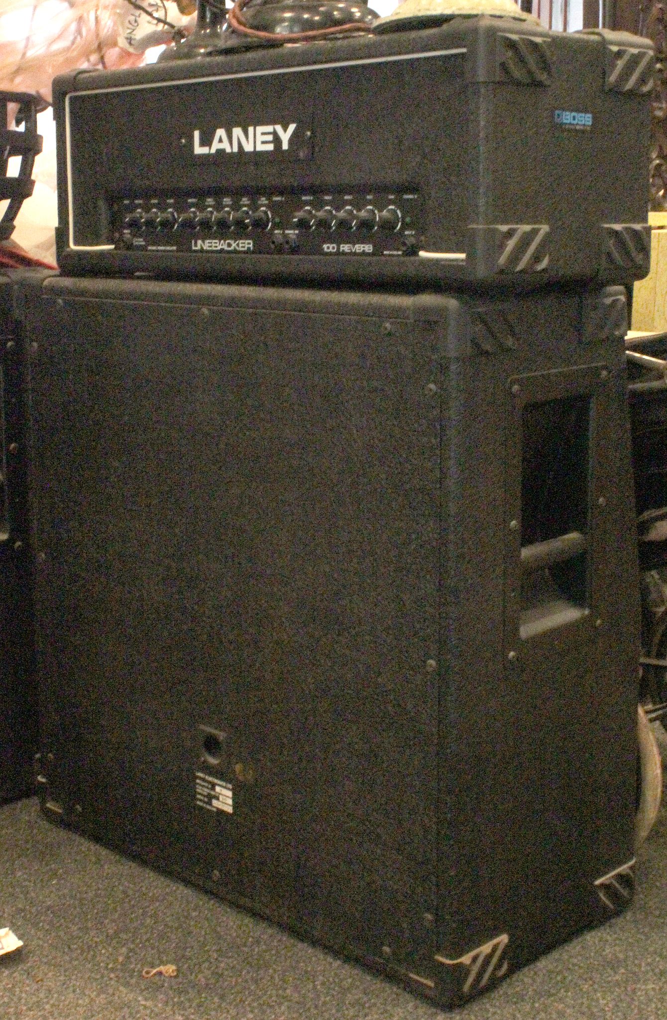 A Laney 100 Watt amplifier and two cabs and bag of connector leads. (4)