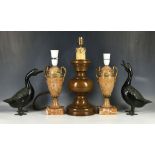 A pair of gilt bronze mounted urn form marble lamp bases on socket and plinth, a bronze lamp base of