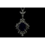 An 18ct white gold, sapphire and diamond cluster drop necklace (sapphire 4.5cts, diamonds 1.79cts