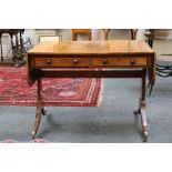 A 19th Century mahogany sofa table with two piece drawer, and raised on style end on outswept feet