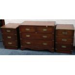 A mahogany campaign style chest of two short over two long drawers raised on bracket feet, sold