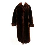 A vintage dark brown beaver fur, full length, ladies' coat, large collar and cuffs, satin lining,