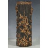 A Chinese bamboo brush pot, applied floral and dragon decoration, gilt and red highlights, 23.5cm