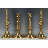 Two pairs of Victorian brass candlesticks to include a pair "The Queen of Diamonds", height 25.5 and
