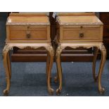 A pair of walnut French style pedestal cabinets. (2)