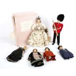 Six 1950s painted composition dolls and half dolls, including a boxed “Coronation of HM Queen
