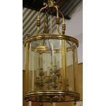 A heavy gauge brass and glass hall lantern of heroic proportions, 115cm tall x 56cm dia, with a nine